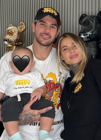  Theo Hernandez with his partner and baby.